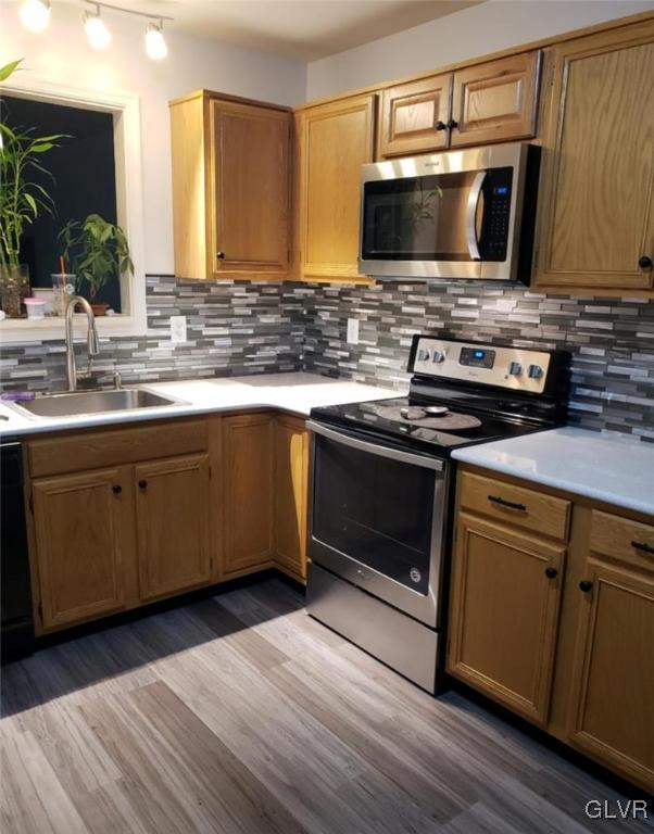 40 Corriere Road Easton, PA 18045 - Photo 18 of 44 a kitchen with stainless steel appliances a stove a sink and a microwave