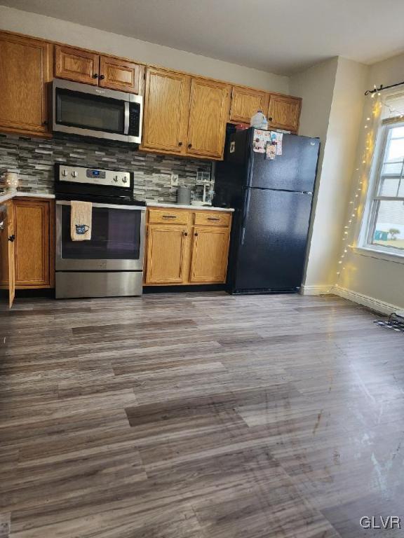 40 Corriere Road Easton, PA 18045 - Photo 21 of 44 a kitchen with stainless steel appliances granite countertop a refrigerator a stove a sink and a microwave