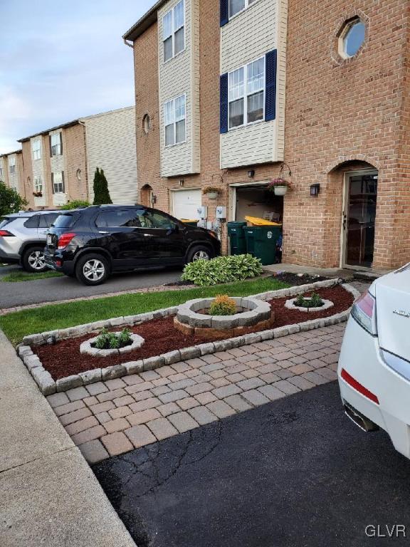 40 Corriere Road Easton, PA 18045 - Photo 3 of 44 a view of a car parked in front of a brick house