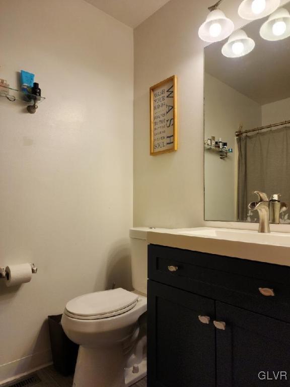 40 Corriere Road Easton, PA 18045 - Photo 36 of 44 a bathroom with a sink mirror vanity and toilet