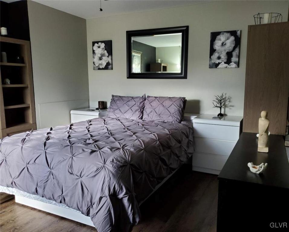 40 Corriere Road Easton, PA 18045 - Photo 8 of 44 a bedroom with a bed and the wall painting