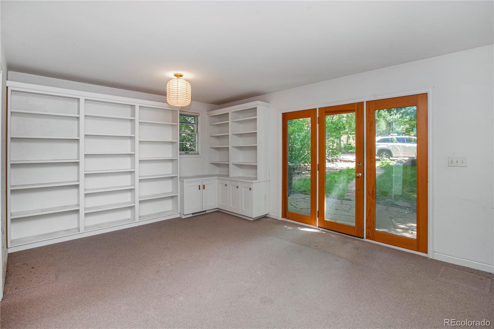 609 Pleasant Street Boulder, CO 80302 - Photo 14 of 28 a view of an empty room with a window