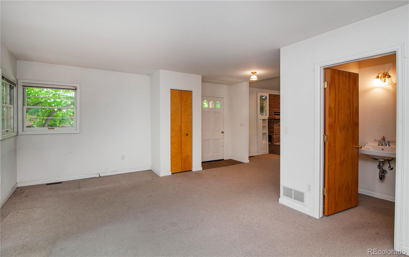 609 Pleasant Street Boulder, CO 80302 - Photo 17 of 28 an empty room with windows and closet