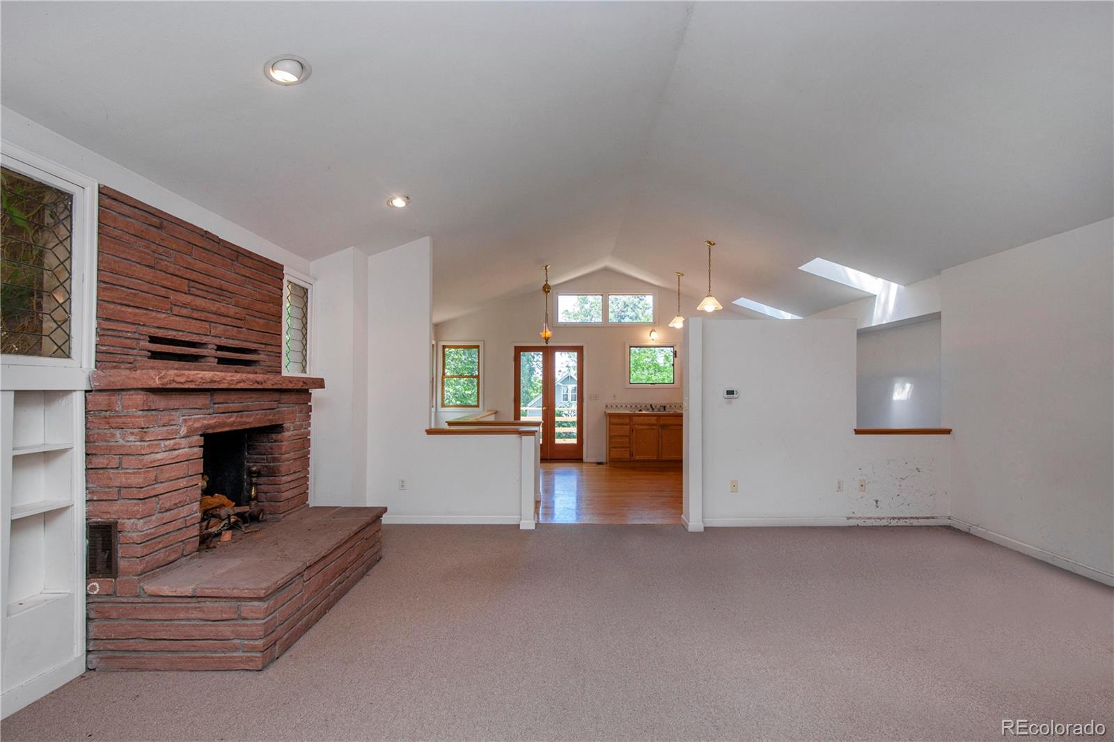 609 Pleasant Street Boulder, CO 80302 - Photo 5 of 28 a view of a livingroom with a fireplace