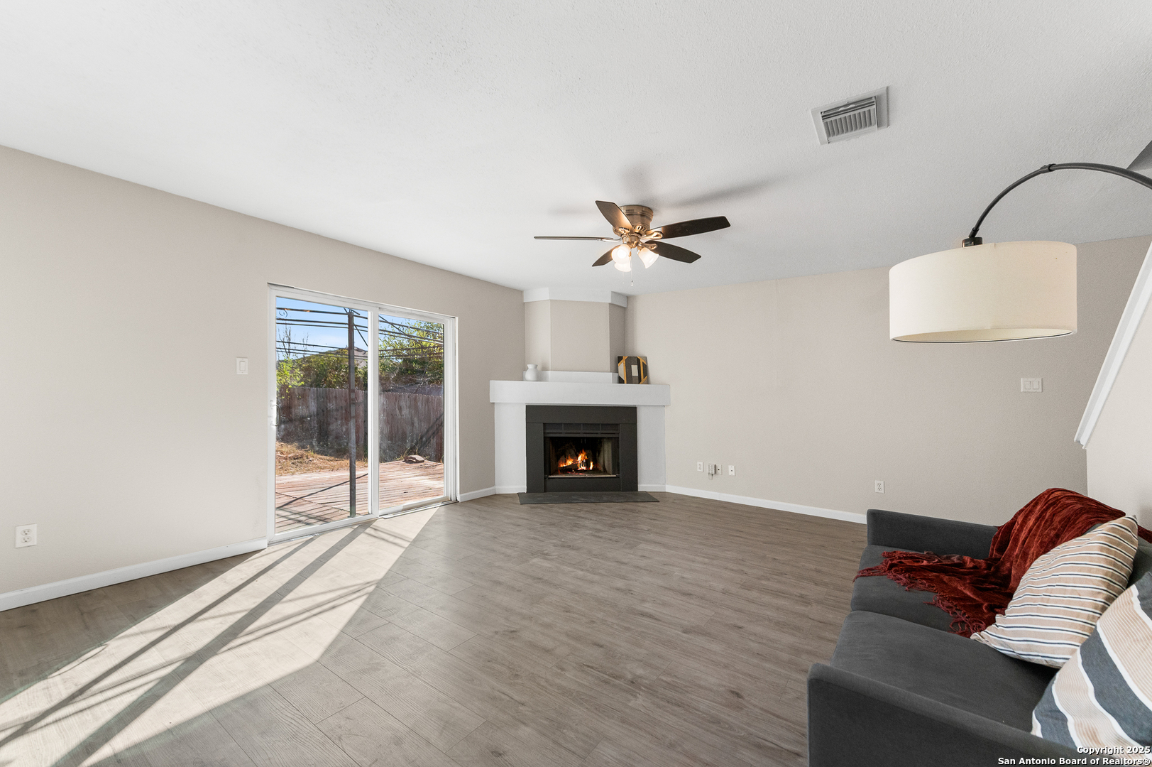8010 Chestnut Gate Drive Converse, TX 78109 - Photo 5 of 37 a view of livingroom with furniture fireplace and window