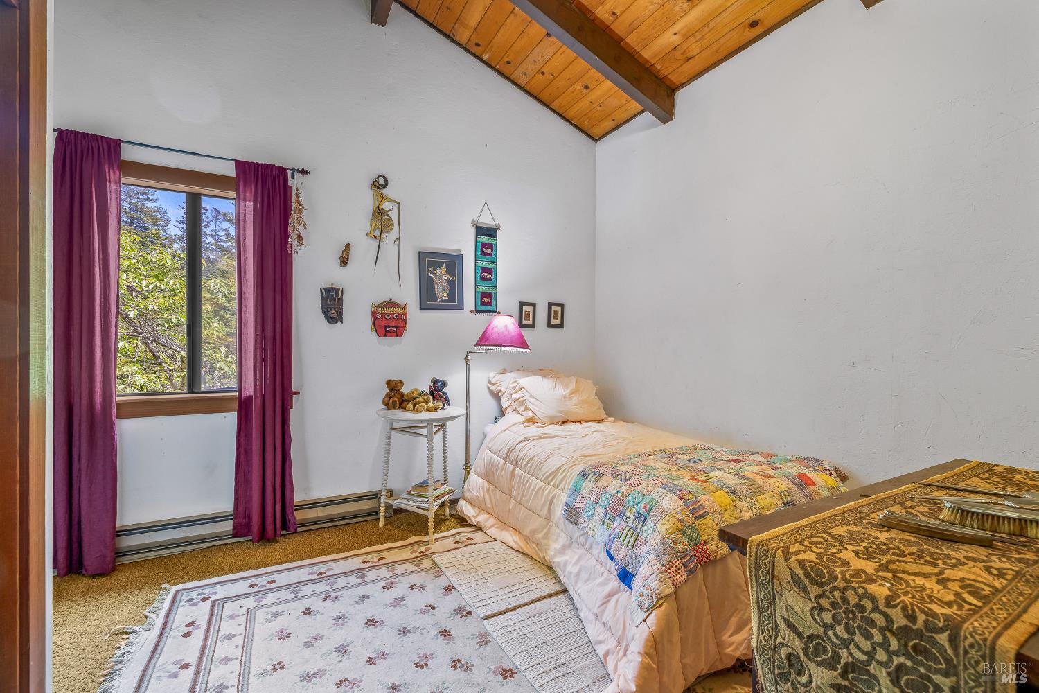 43150 Little Lake Road Mendocino, CA 95460 - Photo 18 of 27 a bedroom with a bed and a window