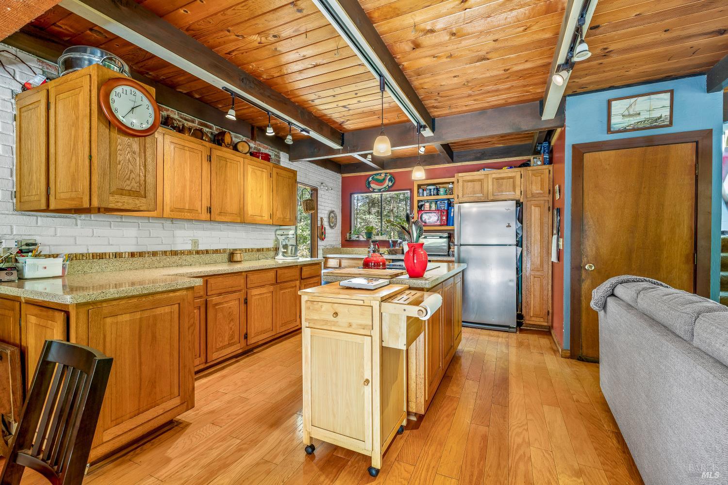43150 Little Lake Road Mendocino, CA 95460 - Photo 8 of 27 a kitchen with a stove and a refrigerator