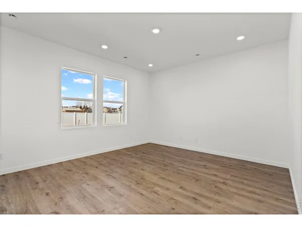 a view of kitchen with wooden floor