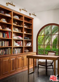 a view of a workspace with furniture