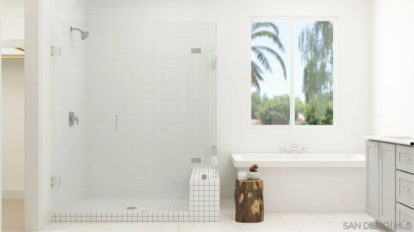 17451 Abbey Road Poway, CA 92064 - Photo 14 of 30 a bathroom with a bathtub and a shower