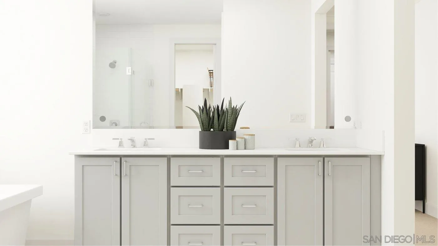 17451 Abbey Road Poway, CA 92064 - Photo 22 of 30 a bathroom with a sink and a mirror