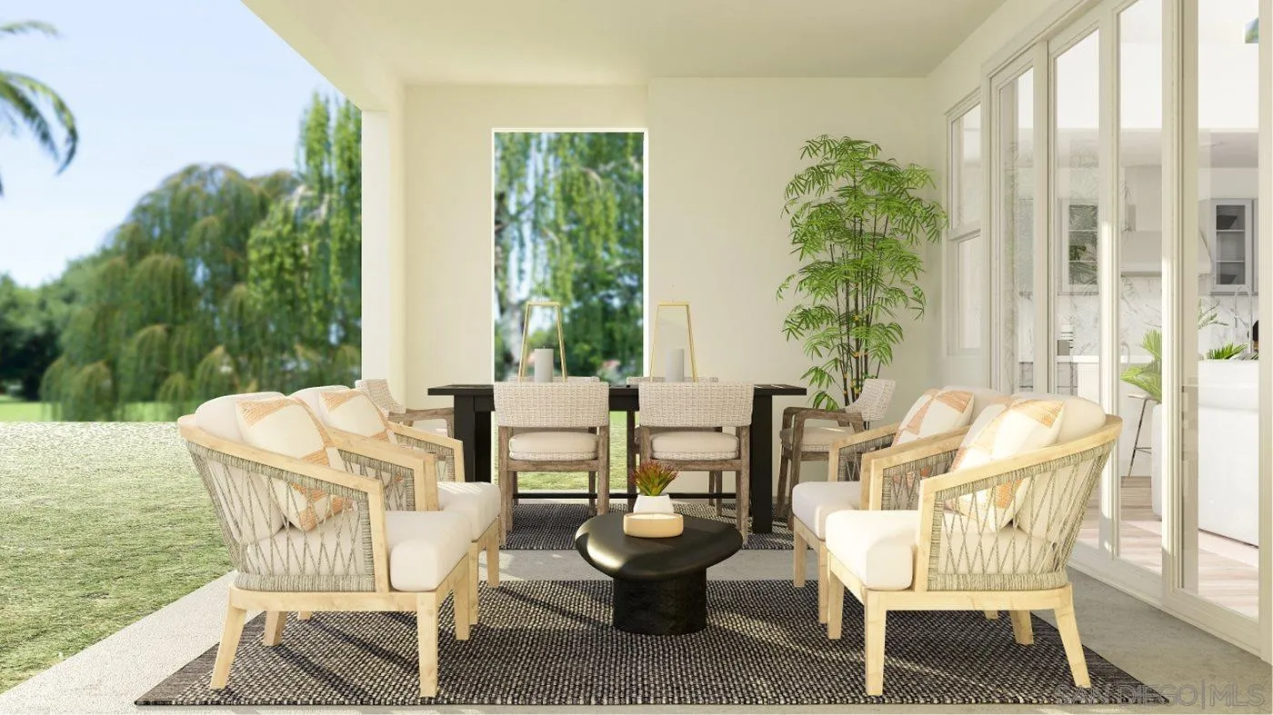17451 Abbey Road Poway, CA 92064 - Photo 28 of 30 a view of a patio with table and chairs and floor to ceiling window