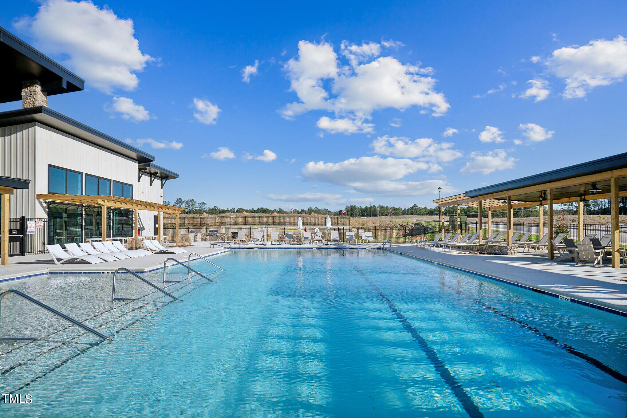 908 Siskin Road Knightdale, NC 27545 - Photo 46 of 69 SUN_Stoneriver_Pic_Amenity_PoolDeck_2of8