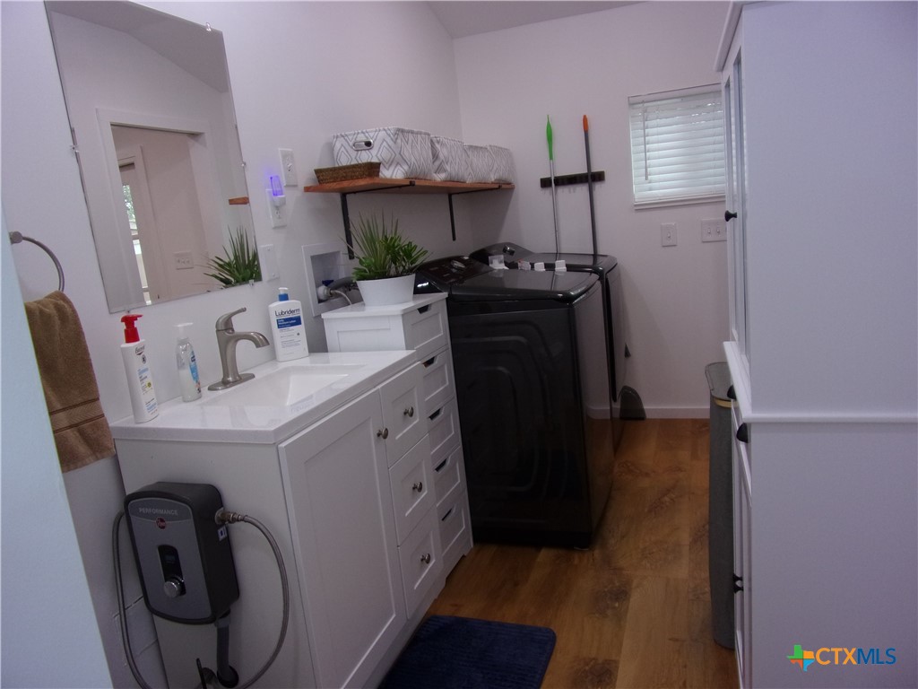 2471 Rolling River View Spring Branch, TX 78070 - Photo 13 of 23 a utility room with dryer and washer
