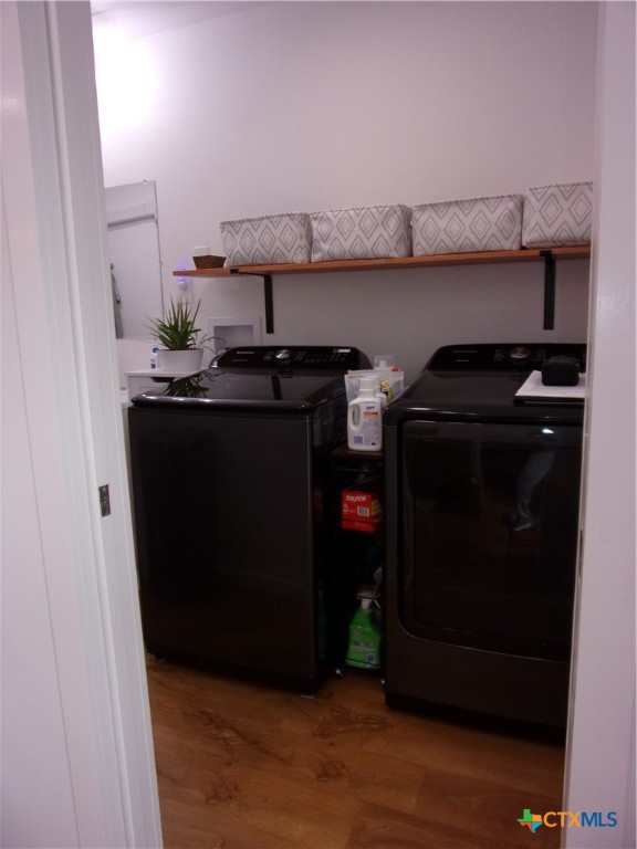 2471 Rolling River View Spring Branch, TX 78070 - Photo 14 of 23 a close view of a stove a microwave and cabinets