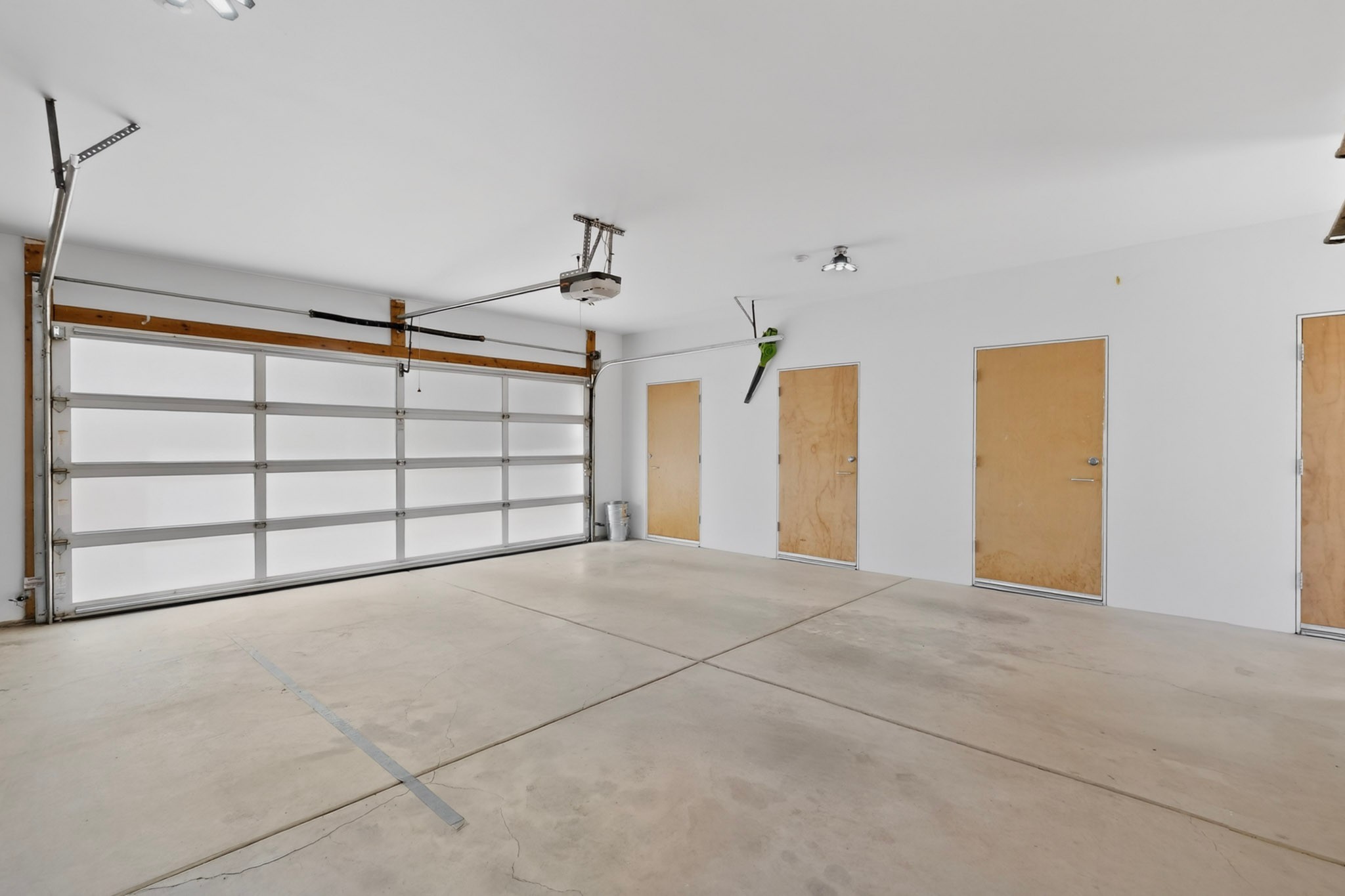 4 Vallecito Road Santa Fe, NM 87506 - Photo 57 of 65 Lots of storgae in the garage. Also an EV charger