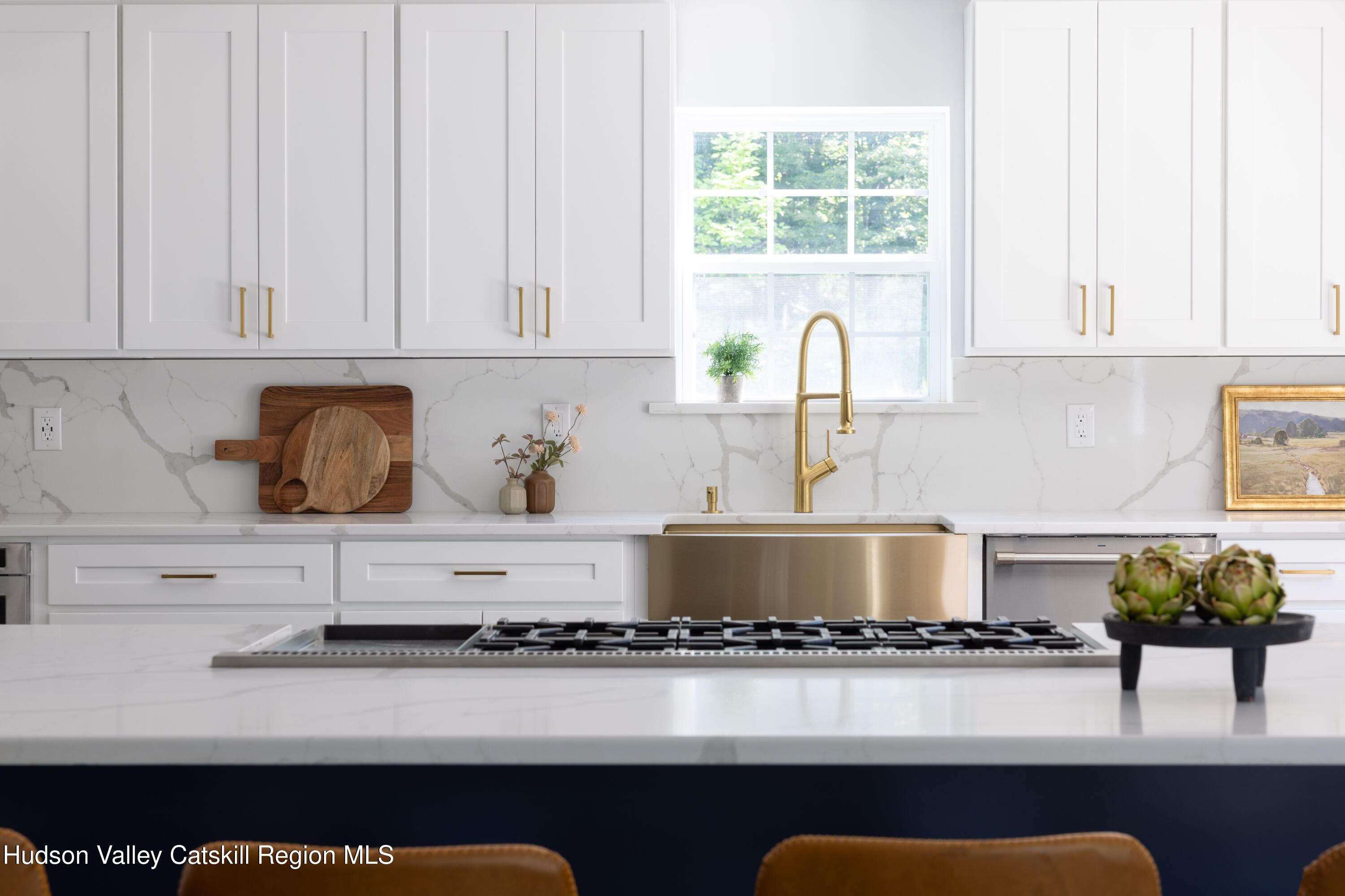 2733 Highway 209 Kingston, NY 12401 - Photo 16 of 52 a kitchen with stainless steel appliances granite countertop a stove a sink and a white cabinets