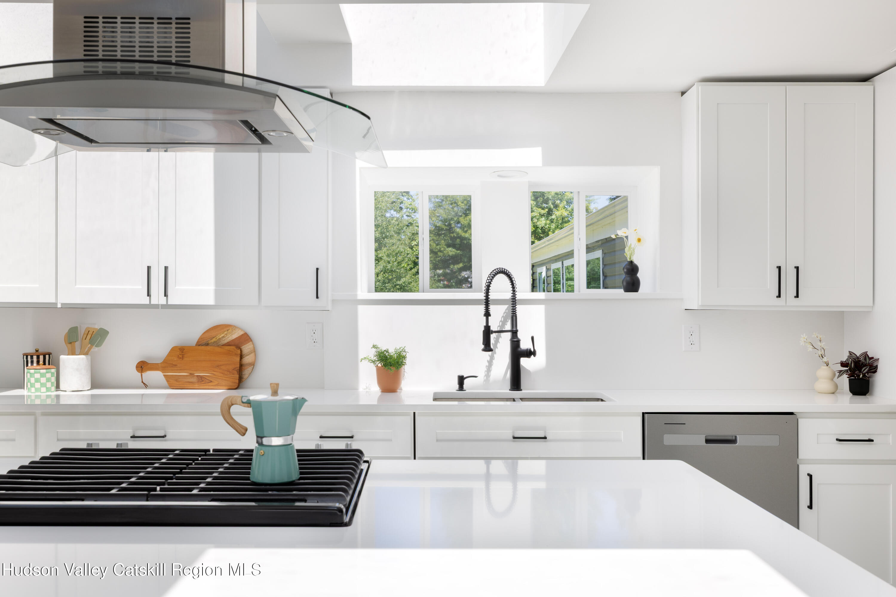 2733 Highway 209 Kingston, NY 12401 - Photo 21 of 52 a kitchen with a stove a refrigerator and a window