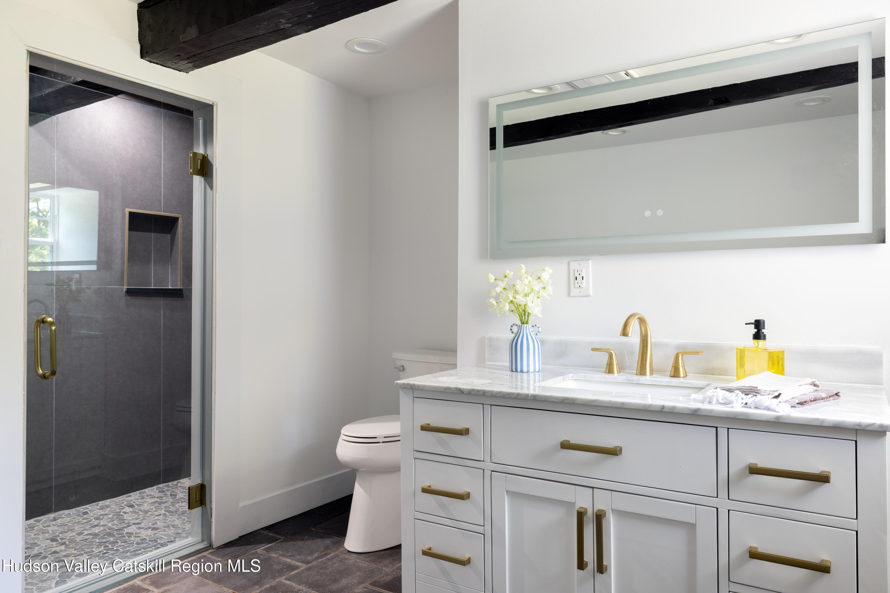 2733 Highway 209 Kingston, NY 12401 - Photo 25 of 52 a bathroom with a sink and a mirror