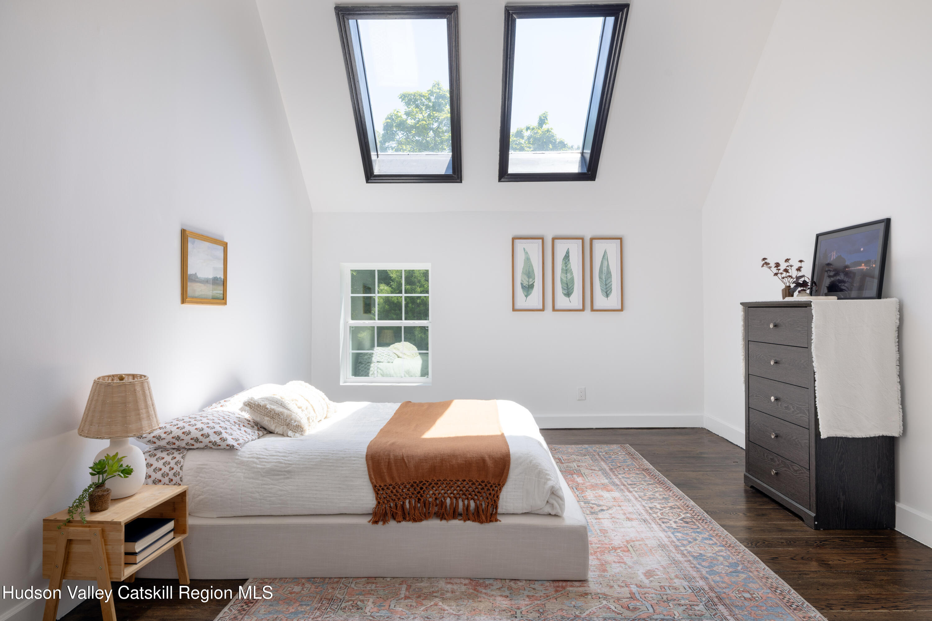 2733 Highway 209 Kingston, NY 12401 - Photo 32 of 52 a bedroom with a bed and wooden floor