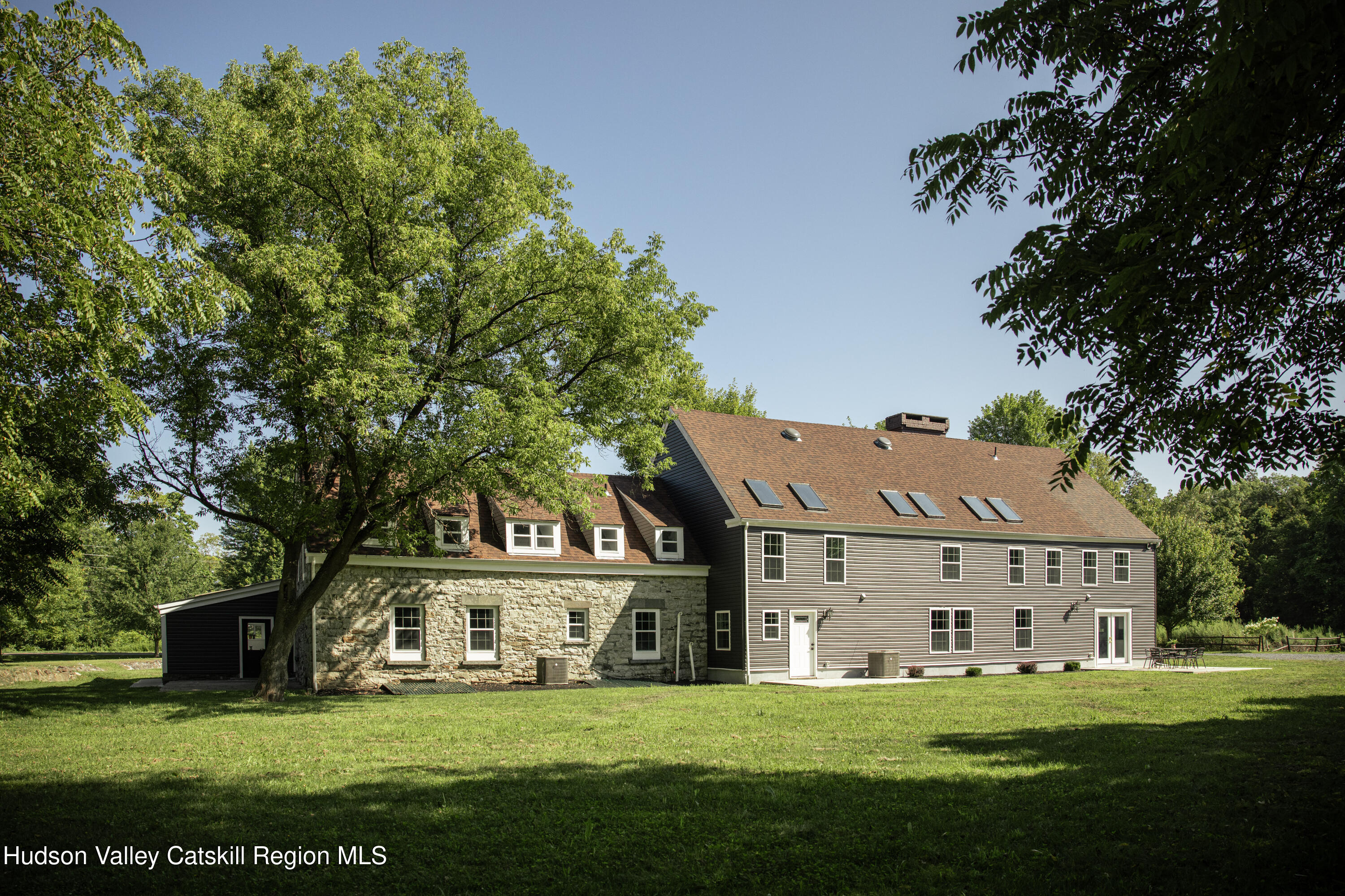 2733 Highway 209 Kingston, NY 12401 - Photo 41 of 52 a view of a white house in front of a big yard with large trees