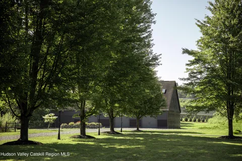 a garden view with a fountain
