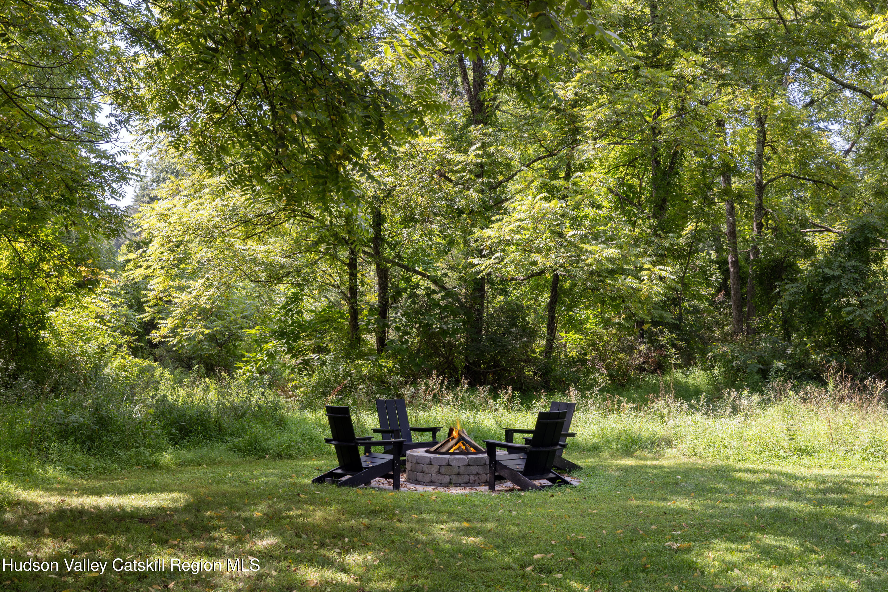 2733 Highway 209 Kingston, NY 12401 - Photo 47 of 52 a backyard of a house with table and chairs