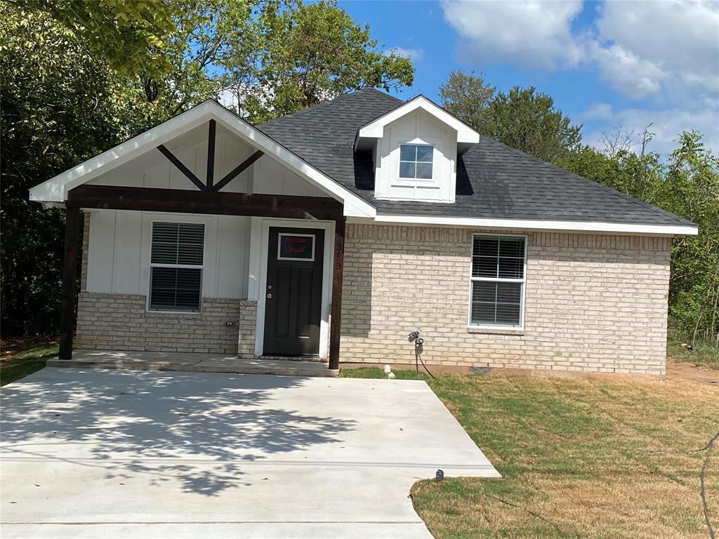 313 East Nelson Street Denison, TX 75021 - Photo 1 of 22
