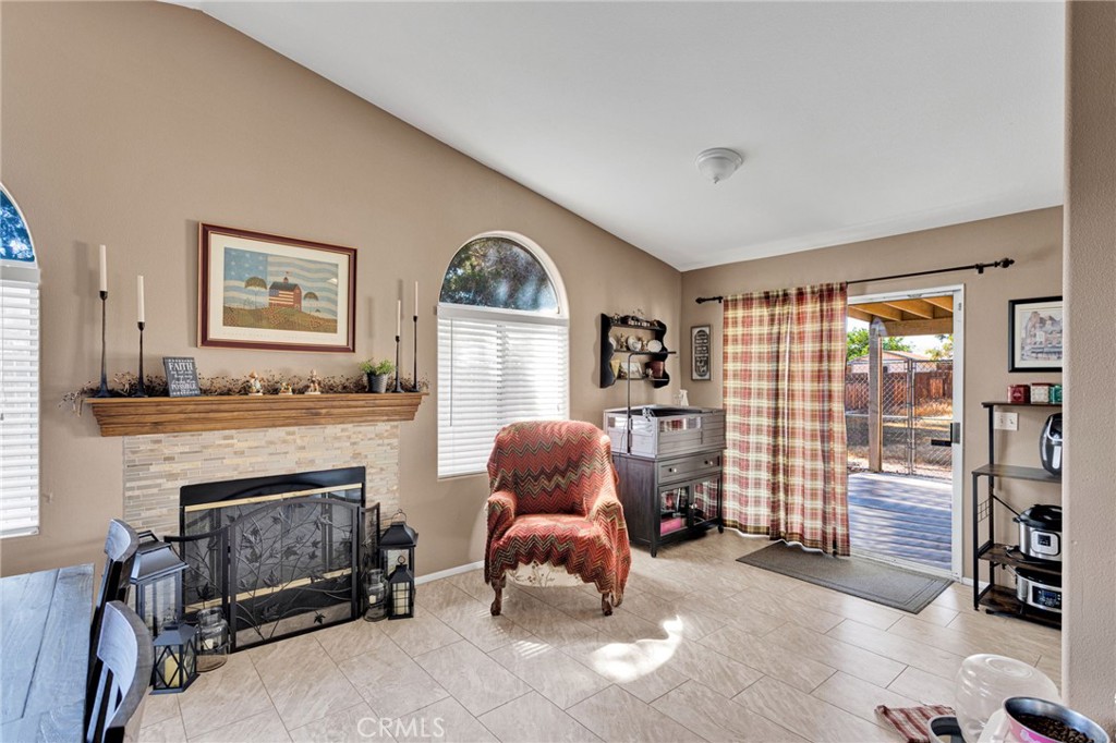 20403 Ochoa Road Apple Valley, CA 92307 - Photo 24 of 48 a living room with furniture and a fireplace