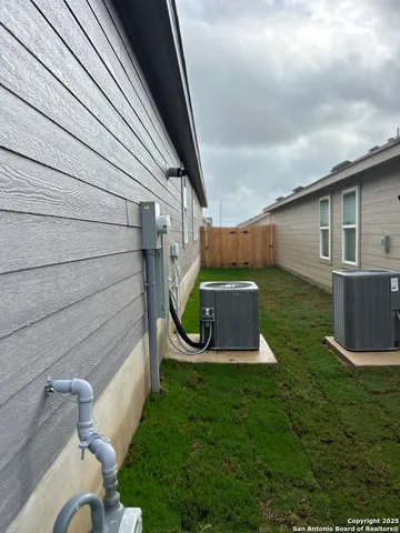 a view of a back yard of the house