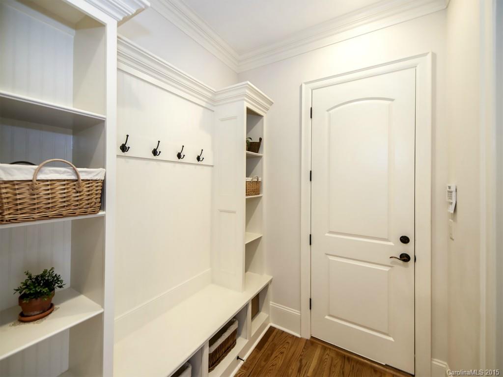 262 Horton Grove Road Fort Mill, SC 29715 - Photo 12 of 24 a view of hallway with cabinets and wooden floor