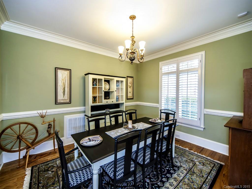 262 Horton Grove Road Fort Mill, SC 29715 - Photo 3 of 24 a view of a dining room with furniture and a chandelier