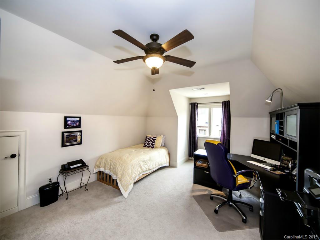 262 Horton Grove Road Fort Mill, SC 29715 - Photo 21 of 24 a bedroom with a bed and a desk