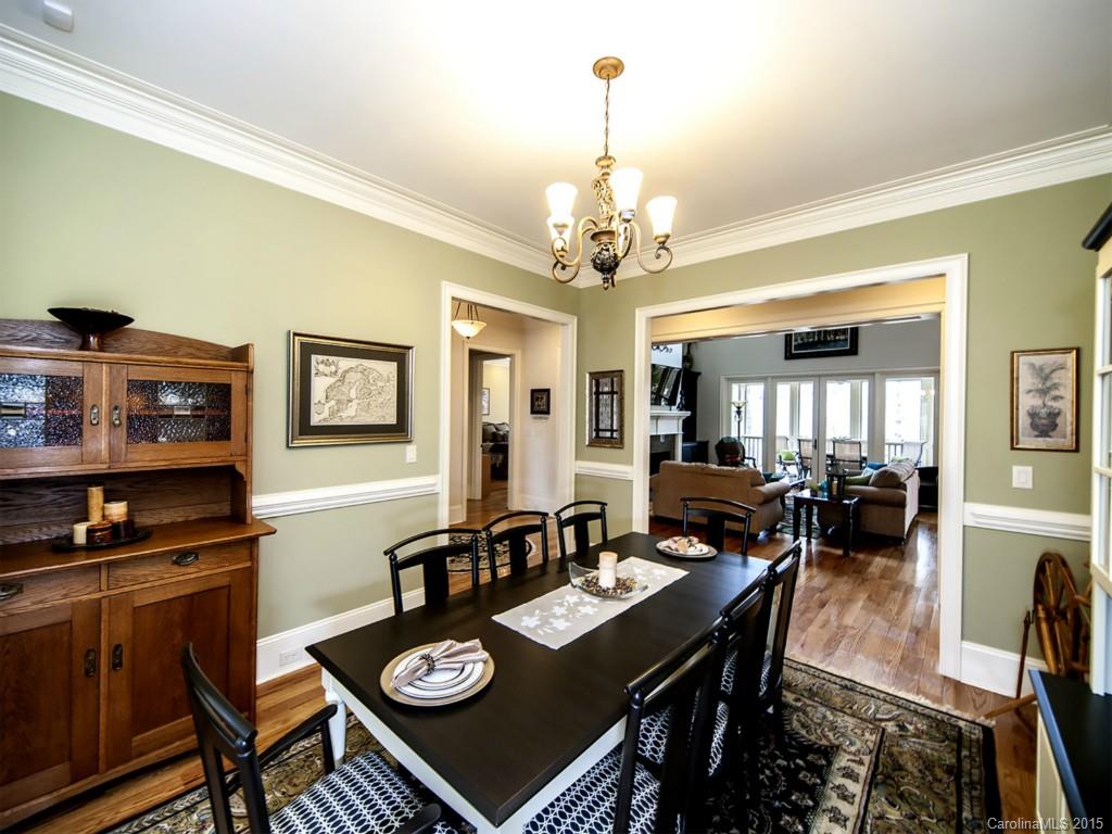 262 Horton Grove Road Fort Mill, SC 29715 - Photo 4 of 24 a view of a dining room with furniture and wooden floor