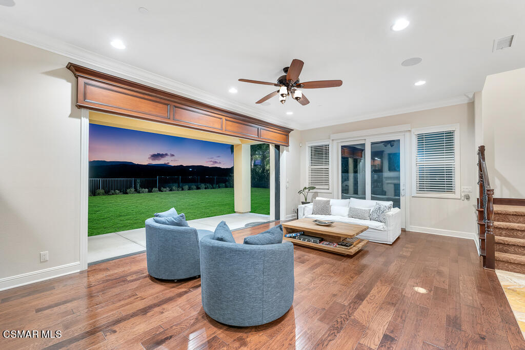 7379 Nicklaus Road Moorpark, CA 93021 - Photo 21 of 85 a living room with patio furniture and a garden