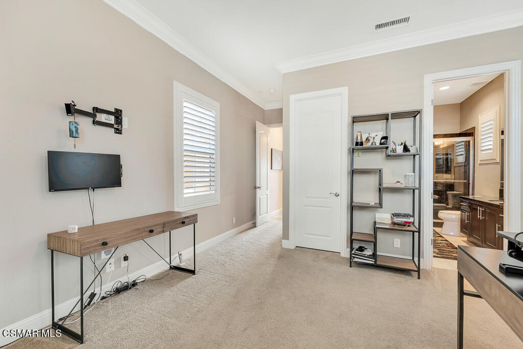 7379 Nicklaus Road Moorpark, CA 93021 - Photo 30 of 85 a living room with furniture and a flat screen tv