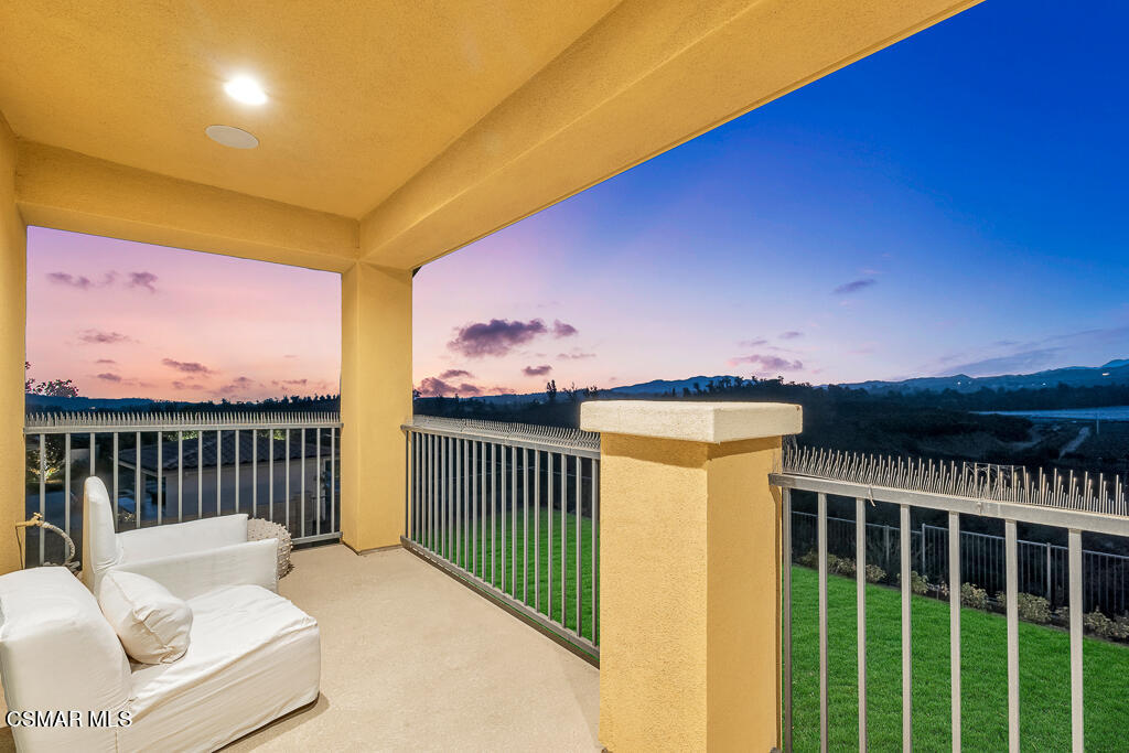 7379 Nicklaus Road Moorpark, CA 93021 - Photo 39 of 85 a view of a patio with a table and chairs
