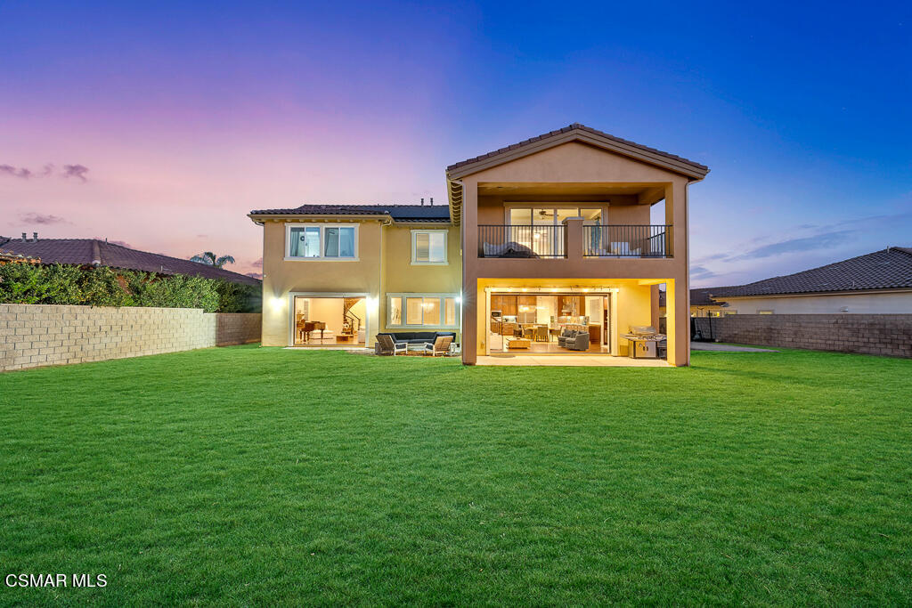 7379 Nicklaus Road Moorpark, CA 93021 - Photo 58 of 85 a front view of a house with a yard