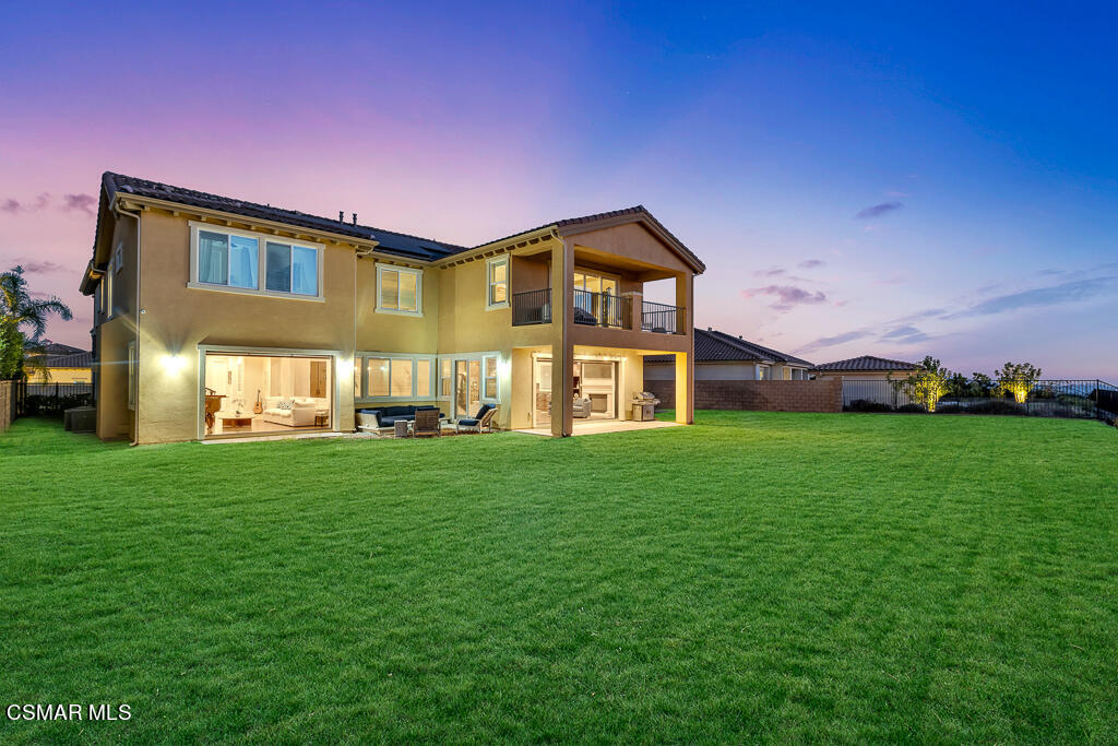 7379 Nicklaus Road Moorpark, CA 93021 - Photo 59 of 85 a front view of a house with a yard