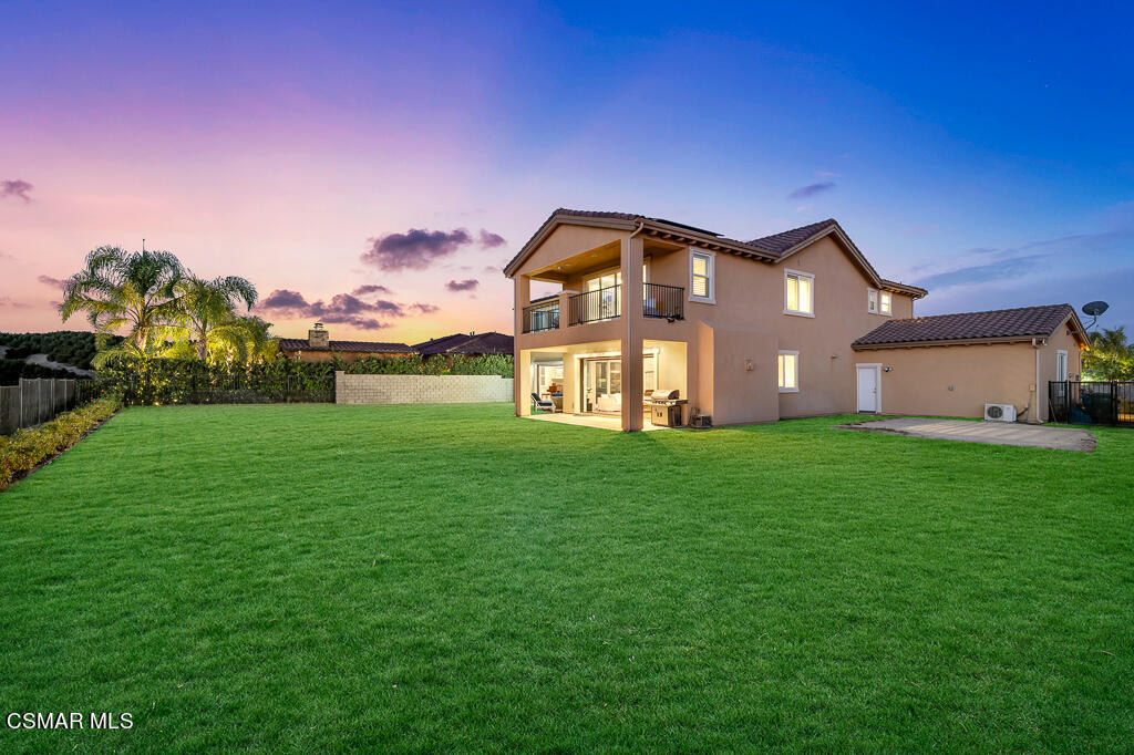 7379 Nicklaus Road Moorpark, CA 93021 - Photo 60 of 85 a front view of a house with a yard
