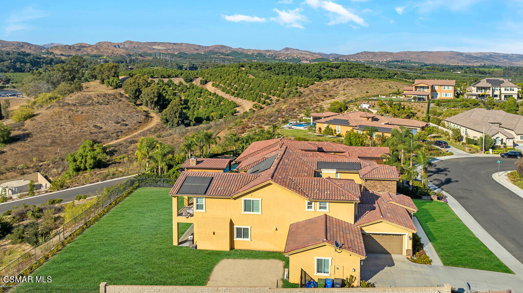 7379 Nicklaus Road Moorpark, CA 93021 - Photo 71 of 85 an aerial view of residential houses with outdoor space and river