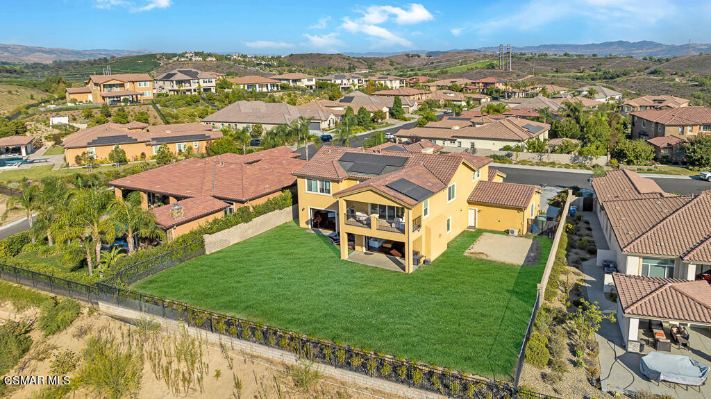 7379 Nicklaus Road Moorpark, CA 93021 - Photo 72 of 85 an aerial view of residential houses with outdoor space and trees