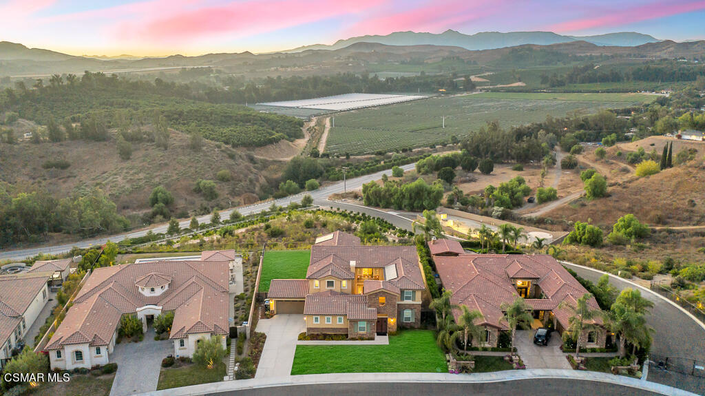 7379 Nicklaus Road Moorpark, CA 93021 - Photo 76 of 85 an aerial view of residential houses with outdoor space and river