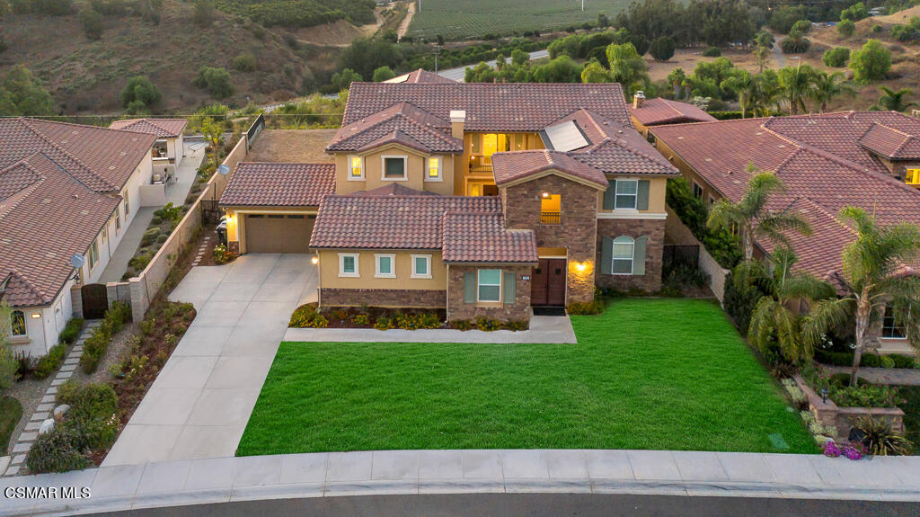 7379 Nicklaus Road Moorpark, CA 93021 - Photo 77 of 85 a aerial view of a house with a yard