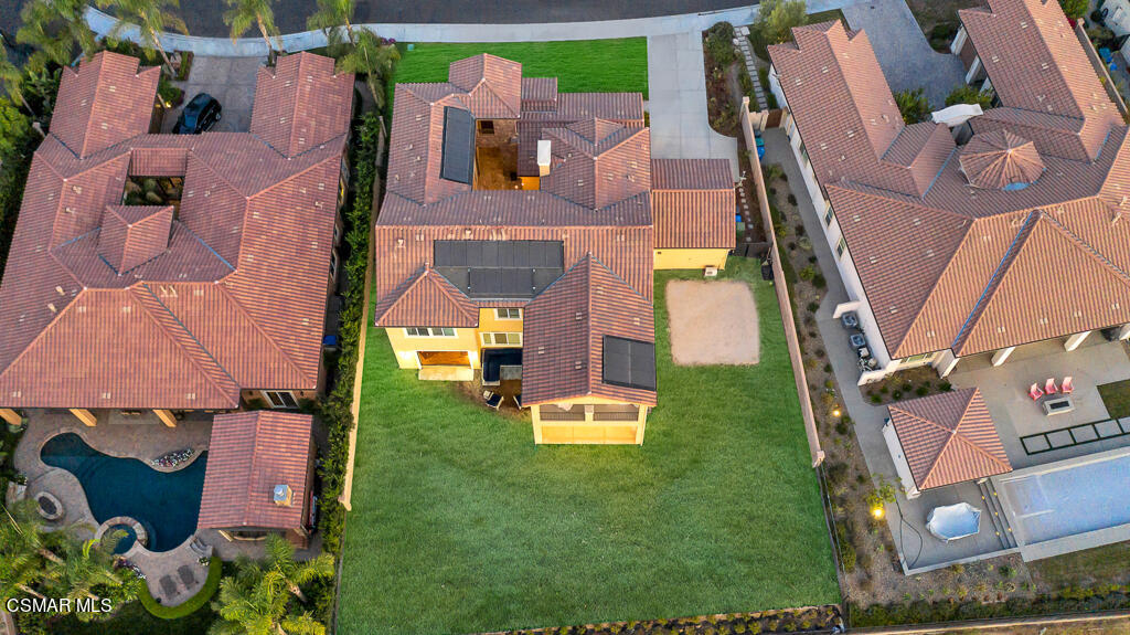7379 Nicklaus Road Moorpark, CA 93021 - Photo 79 of 85 an aerial view of a house with a garden and large trees