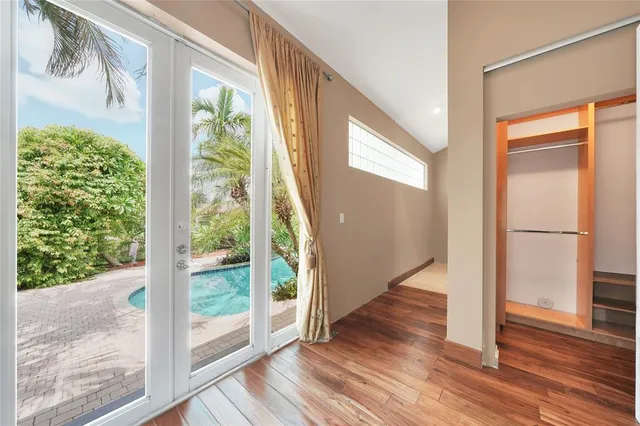 a view of front door and wooden floor