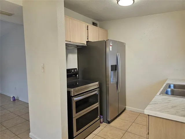 a view of a utility room with a window