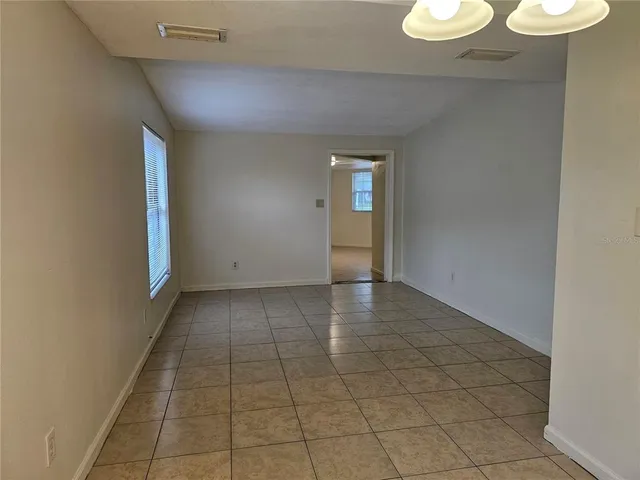 a view of an empty room and window