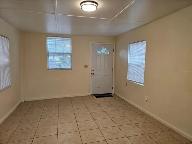 a view of an empty room with window