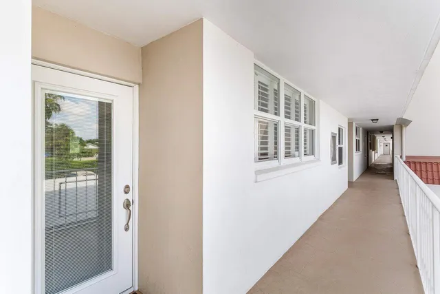 a hallway with windows